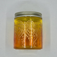 Load image into Gallery viewer, Hand Stained - Hand Painted glass jar - orange fading to yellow (ombre) with intricate gold (henna style) designs.
