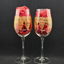 Load image into Gallery viewer, Hand Painted crystal wine glassess - intricate henna inspired art in Gold.
