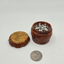 Load image into Gallery viewer, Small 4 part Herb Grinder with Kief catcher. Hand painted henna designs on imitation wood. Sharp teeth, magnetic closure with smooth grinding
