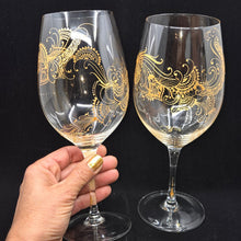 Load image into Gallery viewer, Hand Painted crystal wine glasses - intricate henna inspired art in Gold.
