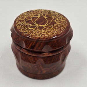 Small 4 part Herb Grinder with Kief catcher. Hand painted gold lotus on imitation wood.