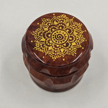 Load image into Gallery viewer, Small 4 part Herb Grinder with Kief catcher. Hand painted gold mandala on imitation wood. Sharp teeth, magnetic closure with smooth grinding
