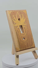 Load and play video in Gallery viewer, Hand Painted Cherry wood Switch / Cover / Wall plate for Toggle switch - Midsized. Gold lotus with henna inspired designs on solid wood
