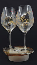 Load and play video in Gallery viewer, Hand Painted Riedel crystal wine glasses - intricate henna inspired art in Gold.
