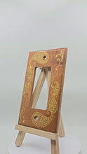 Load and play video in Gallery viewer, Hand Painted Cherry wood Switch / Cover / Wall plate for Paddle switch or decora outlet -Midsized. Gold henna inspired designs on solid wood.
