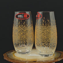 Load and play video in Gallery viewer, Hand Painted Riedel crystal wine glasses - intricate henna inspired art in Gold.
