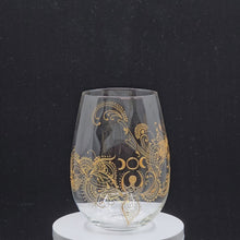 Load and play video in Gallery viewer, Hand Painted Sacred Goddess Chalice Goblet Wine Glass . Goddess figure with moon cycles and intricate gold (henna style) designs- Stemless
