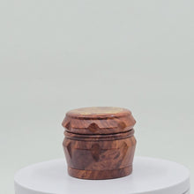 Load and play video in Gallery viewer, Small 4 part Herb Grinder with Kief catcher. Hand painted gold mushrooms on imitation wood. Sharp teeth, magnetic closure with smooth grinding
