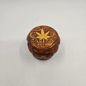 Medium size 4 part Herb Grinder with Kief catcher. Hand painted weed leaf