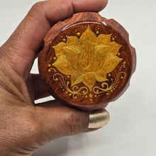 Load image into Gallery viewer, Medium size 4 part Herb Grinder with Kief catcher. Hand painted Lotus on imitation wood. Sharp teeth, magnetic closure with smooth grinding
