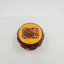 Load image into Gallery viewer, Medium size 4 part Herb Grinder with Kief catcher. Hand painted Turntable on imitation wood. Sharp teeth, magnetic closure with smooth grinding
