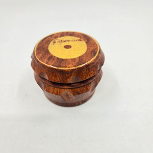 Medium size 4 part Herb Grinder with Kief catcher. Hand painted Studio 1 logo on imitation wood. Sharp teeth, magnetic closure with smooth grinding