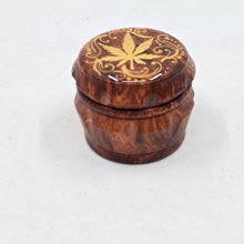 Load image into Gallery viewer, Mini/ tiny 4 part Herb Grinder with Kief catcher. Hand painted weed leaf on imitation wood. Sharp teeth, magnetic closure with smooth grinding
