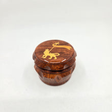 Load image into Gallery viewer, Medium size 4 part Herb Grinder with Kief catcher. Hand painted lion of Judah on imitation wood. Sharp teeth, magnetic closure with smooth grinding
