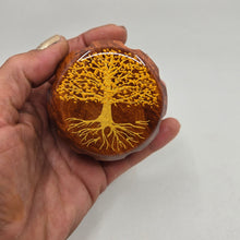 Load image into Gallery viewer, Medium size 4 part Herb Grinder with Kief catcher. Hand painted tree of life on imitation wood. Sharp teeth, magnetic closure with smooth grinding
