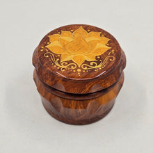 Load image into Gallery viewer, Medium size 4 part Herb Grinder with Kief catcher. Hand painted Lotus on imitation wood. Sharp teeth, magnetic closure with smooth grinding
