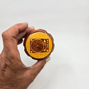 Medium size 4 part Herb Grinder with Kief catcher. Hand painted Turntable on imitation wood. Sharp teeth, magnetic closure with smooth grinding