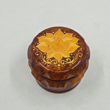 Load image into Gallery viewer, Medium size 4 part Herb Grinder with Kief catcher. Hand painted Lotus on imitation wood. Sharp teeth, magnetic closure with smooth grinding
