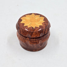 Load image into Gallery viewer, Mini/ tiny 4 part Herb Grinder with Kief catcher. Hand painted Lotus on imitation wood. Sharp teeth, magnetic closure with smooth grinding
