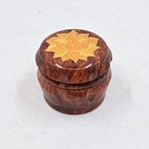 Mini/ tiny 4 part Herb Grinder with Kief catcher. Hand painted Lotus on imitation wood. Sharp teeth, magnetic closure with smooth grinding