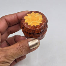 Load image into Gallery viewer, Mini/ tiny 4 part Herb Grinder with Kief catcher. Hand painted Lotus on imitation wood. Sharp teeth, magnetic closure with smooth grinding
