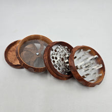 Load image into Gallery viewer, Medium size 4 part Herb Grinder with Kief catcher. Hand painted tree of life on imitation wood. Sharp teeth, magnetic closure with smooth grinding
